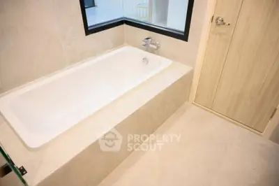 Luxurious bathroom with modern bathtub and elegant design