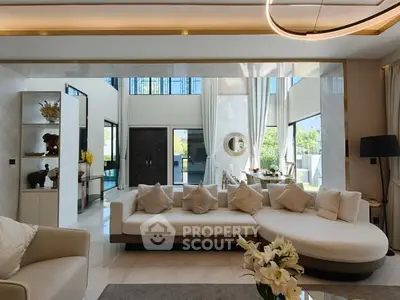 Luxurious modern living room with high ceilings and elegant decor