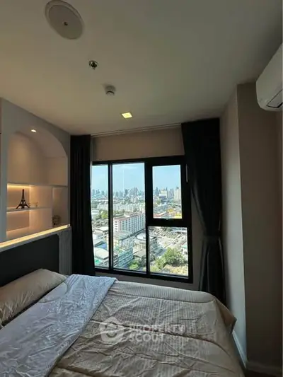 Modern bedroom with city view and elegant decor