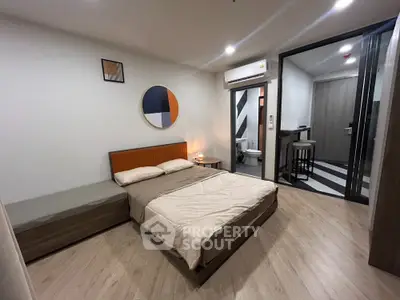 Modern bedroom with ensuite bathroom and stylish decor