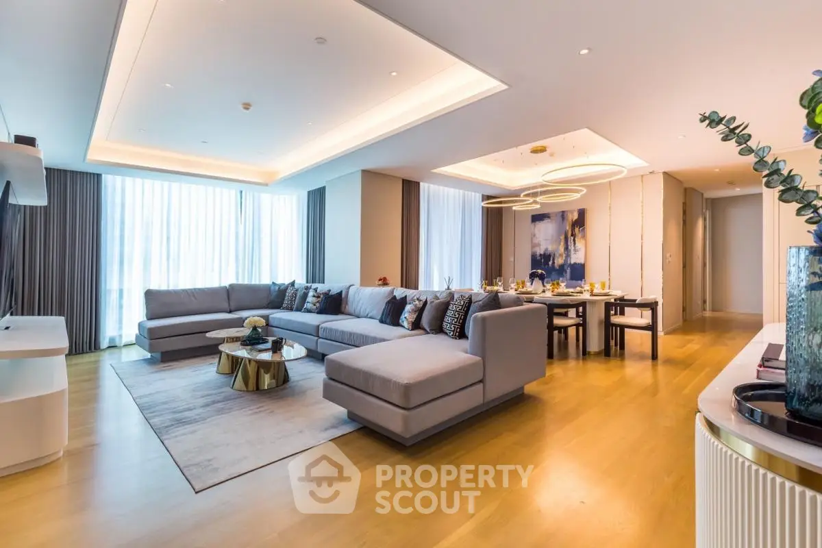 Luxurious modern living room with spacious seating and elegant dining area