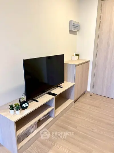 Modern living room with sleek TV stand and minimalist decor