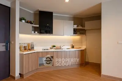 Modern kitchen with sleek cabinetry and open layout design