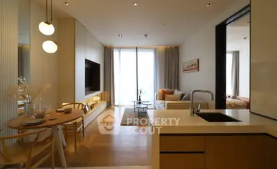 Modern open-plan living room with stylish dining area and natural light