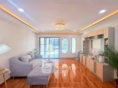 Elegant living room with modern decor and natural light