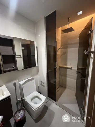 Modern bathroom with sleek shower and contemporary fixtures