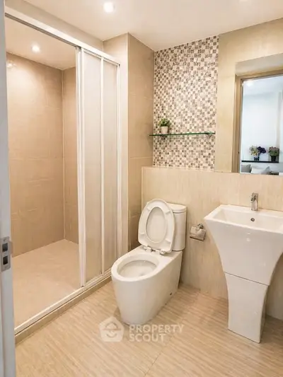 Modern bathroom with sleek fixtures and stylish tile design