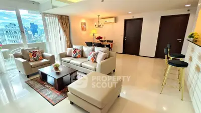 Spacious modern living room with city view and elegant decor