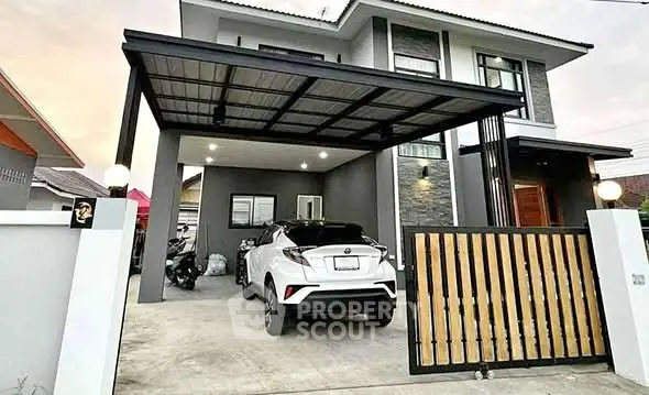 Modern two-story house with carport and sleek exterior design