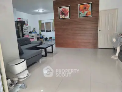 Spacious living room with modern decor and sleek furniture