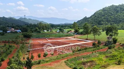 Scenic land plot with mountain views, ideal for development or investment.