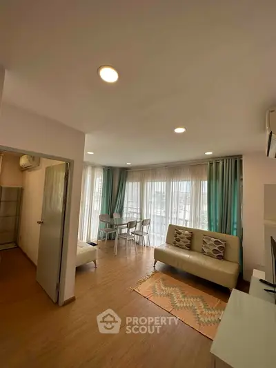 Bright and airy living room with modern decor and large windows