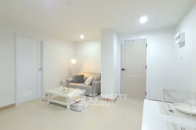 Modern living room with cozy sofa and elegant decor in a bright apartment