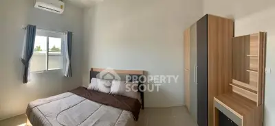 Cozy bedroom with modern furniture and natural light
