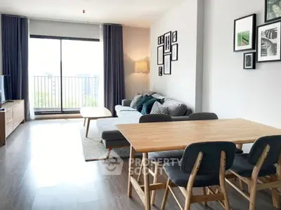 Spacious modern living room with balcony view and stylish decor