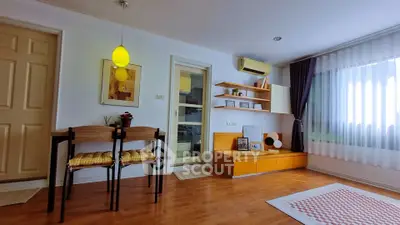 Charming living room with modern decor and natural light