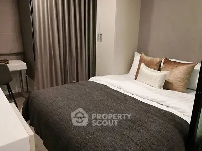 Cozy modern bedroom with stylish decor and comfortable bedding
