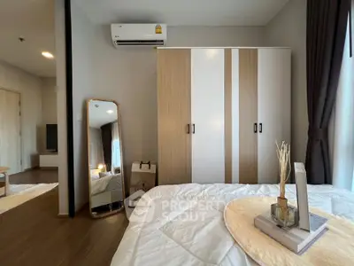 Modern bedroom with stylish decor and ample storage space