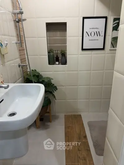Modern bathroom with sleek sink and stylish decor
