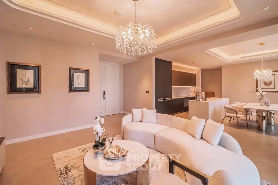 Luxurious open-concept living room with elegant lighting and modern decor