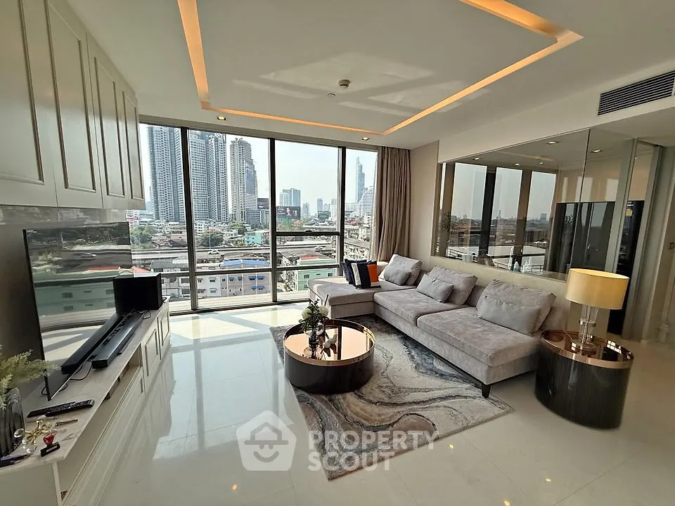Luxurious living room with stunning city view, modern furniture, and elegant decor in high-rise apartment.