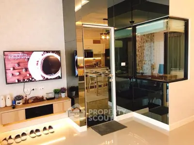 Modern living room with sleek design and open kitchen layout