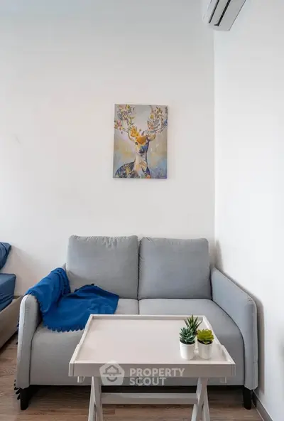 Cozy living room with stylish sofa and modern decor