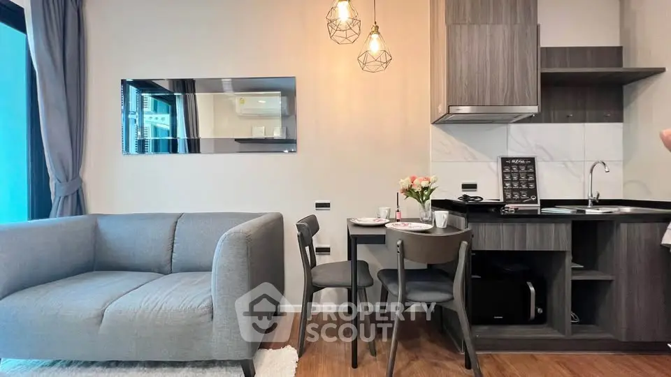 Modern living room with stylish kitchen in open layout apartment