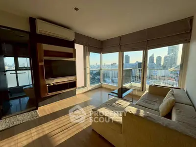 Modern living room with panoramic city view and stylish furniture