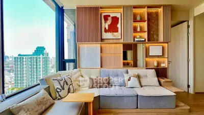 Luxurious modern living room with stunning city view and stylish decor