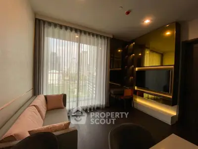 Modern living room with city view, sleek furniture, and floor-to-ceiling windows.