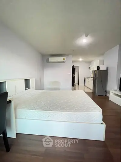 Spacious studio apartment with modern kitchen and cozy living area