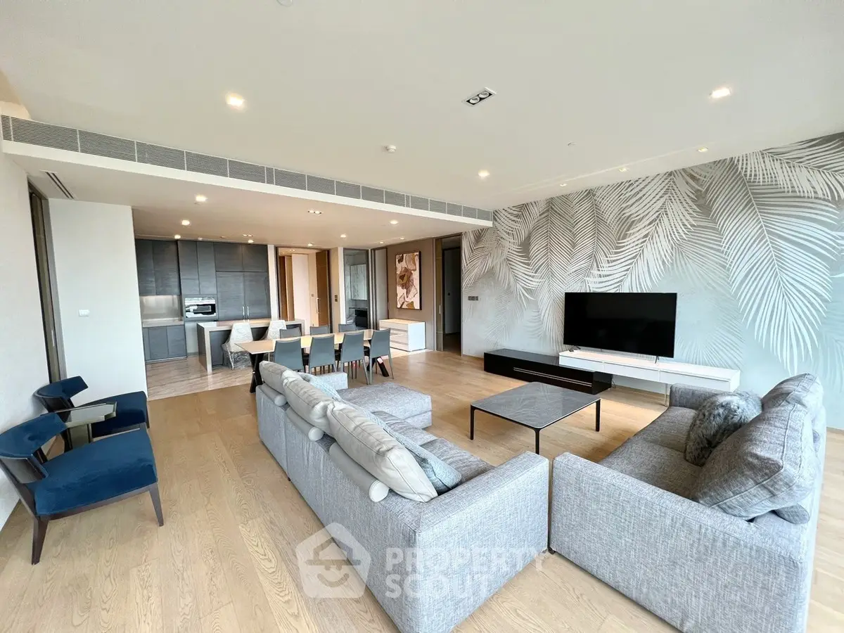 Spacious modern living room with open kitchen and stylish decor