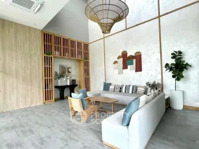 Modern living room with high ceiling and stylish decor