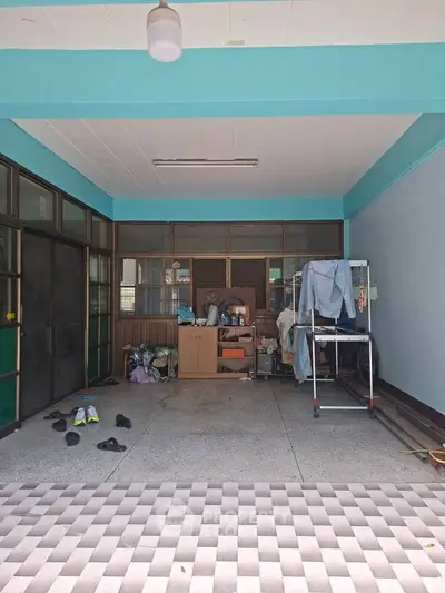 Spacious garage with storage potential in residential property
