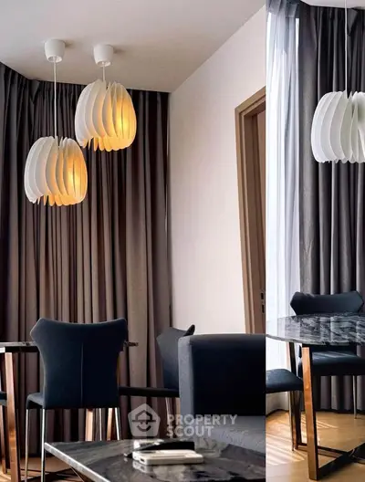 Modern living room with stylish lighting and elegant furniture