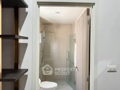 Modern bathroom with glass shower and sleek design
