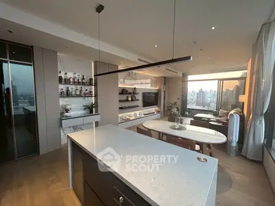 Luxurious modern living room with city view and elegant kitchen island