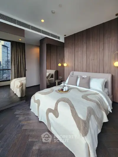 Luxurious modern bedroom with elegant wood paneling and city view, featuring cozy bedding and stylish lighting.