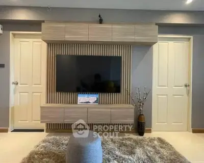 Modern living room with stylish TV unit and cozy decor