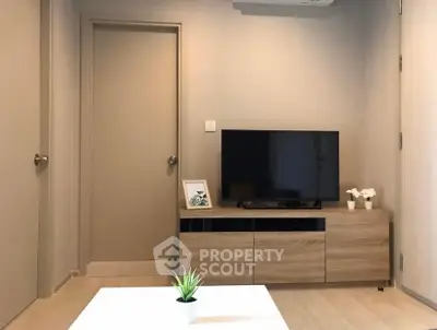 Modern living room with sleek TV stand and minimalist decor