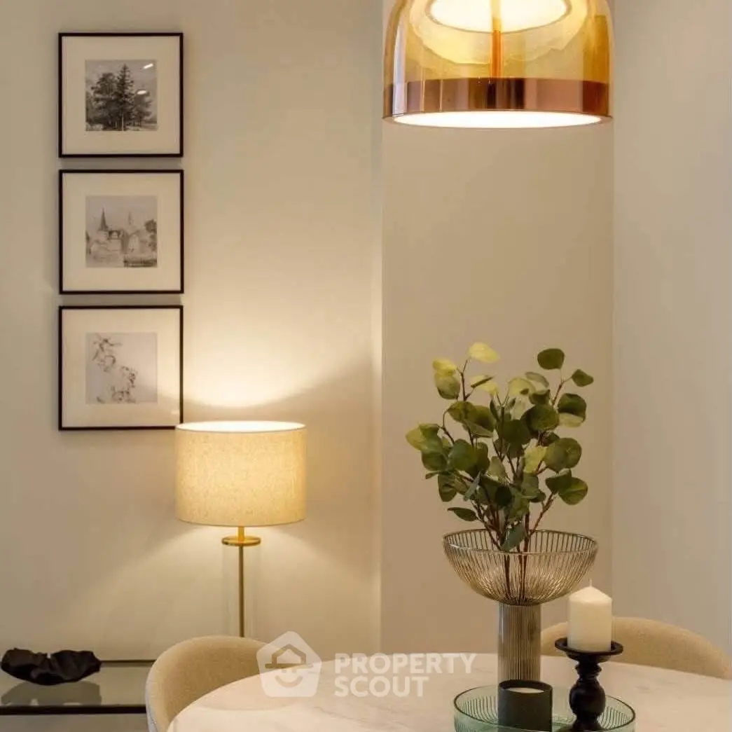 Elegant dining area with modern decor and ambient lighting, perfect for cozy gatherings.