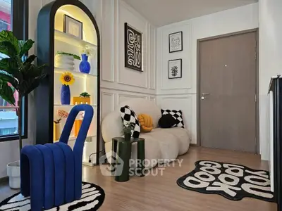 Stylish modern living room with unique furniture and decor, featuring a cozy sofa and vibrant accents.