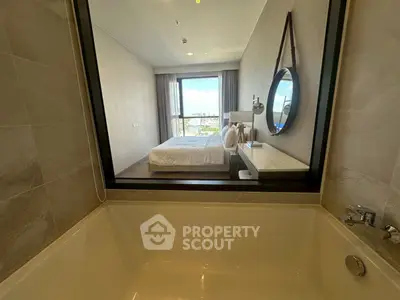 Luxurious hotel-style bedroom with ensuite bathroom and stunning view