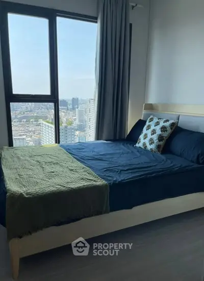 Modern bedroom with city view and stylish decor