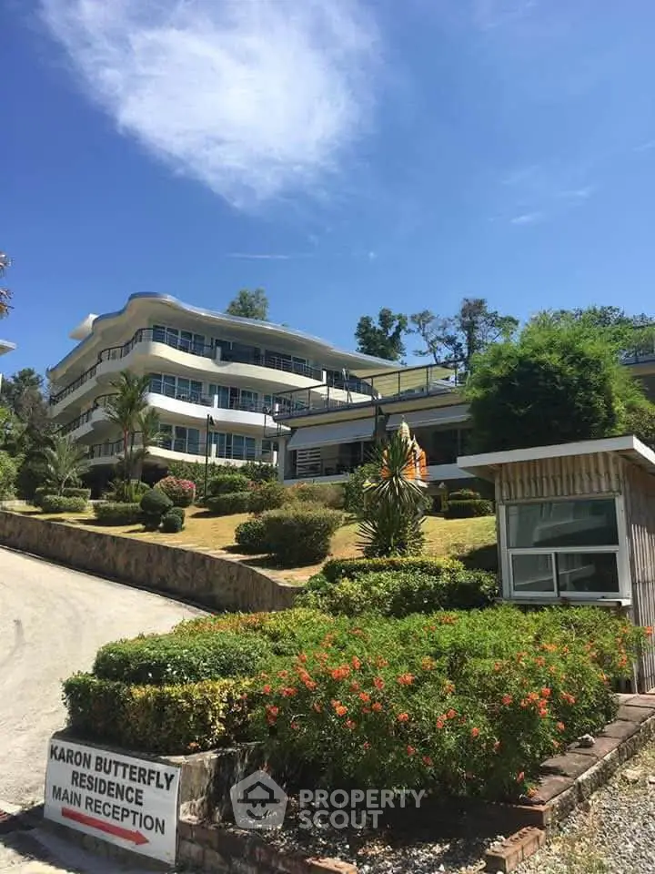 Stunning modern residence with lush gardens and unique architectural design.