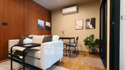 Stylish living room with modern decor and air conditioning, perfect for cozy living.