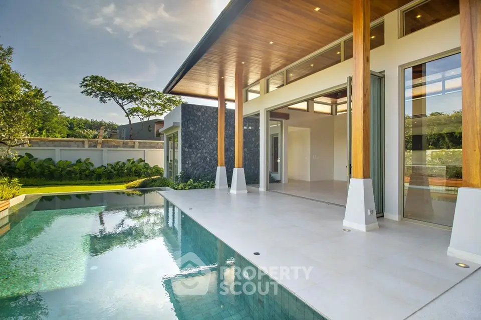 Luxurious modern home with stunning pool and open patio design