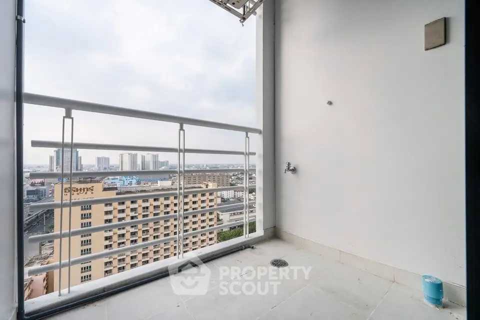 Modern balcony with city view, perfect for relaxation and enjoying the skyline.