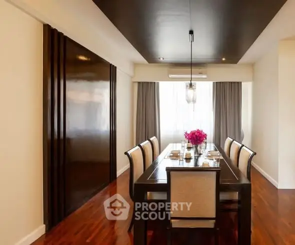 Elegant dining room with wooden flooring and modern decor